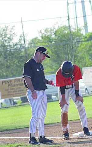 The 2022 Ville Platte Gazette’s Coach of the Year for baseball hails from Pine Prairie High School. Panther head coach Colton Chaddrick (left) led his team to another strong season in his first year as coach. (Photo submitted) 