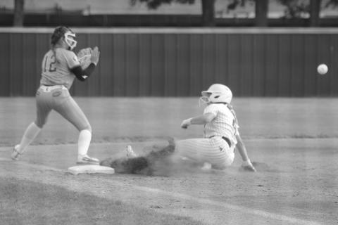 Ellie Wilmouth (4) slides in safely to third base ahead of the throw from a St. Frederick fielder in Sacred Heart’s 10-8 quarterfinal loss last Friday. (Gazette photo by Tony Marks)