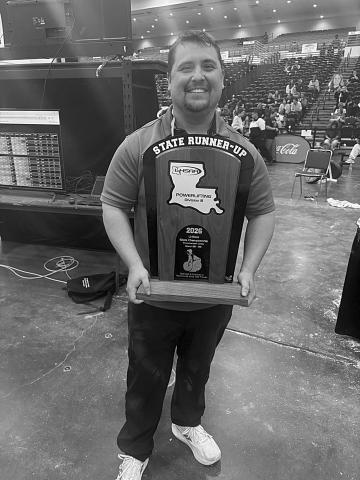 Mamou head powerlifting coach Kirk Taylor is pictured with this year’s girls’ state runner-up trophy. (Photo courtesy of Kirk Taylor)
