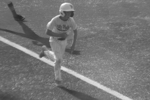 Aeden Guillory scores a run for Ville Platte in the 10-run fourth inning against West Carroll.