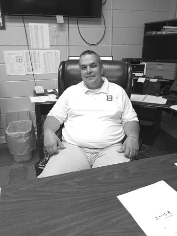 Tony Bertrand takes back his seat in the principal’s office at Basile High School. (LSN photo by Darrel LeJeune)