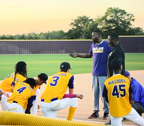 Trumaine Johnson (center) is pictured during a Ville Platte High baseball  game this season. He spent the past season as the team’s head coach. (Photo courtesy of Trumaine Johnson)