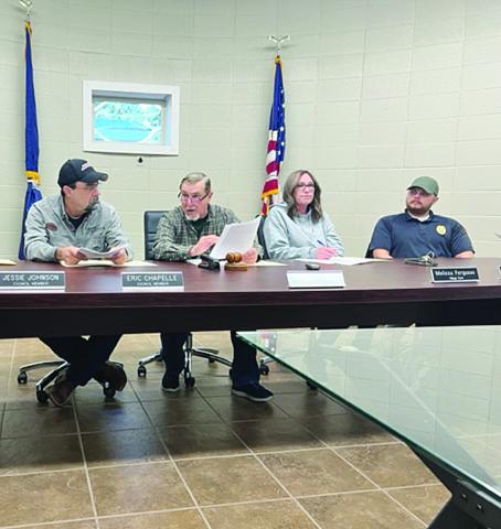 Bert Campbell (second from left) is pictured as he presides over his first meeting as mayor of Turkey Creek. Also pictured are new Mayor Pro-Temp and Councilman Eric Chapelle (left), Village Clerk Melissa Ferguson (second from right) and Assistant Chief of Police Matt Moreau (right). (Gazette photo by Tony Marks)