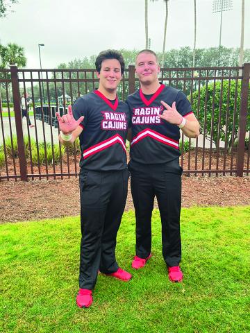 Christian Bergeron (left) and Isaac Cortez, both Basile High alumni, recently competed as members of the UL-L Ragin’ Cajun cheer leading team at the UCA National Collegiate Cheer leading competition in Orlando, where the Cajun squad placed second in the game day spirit contest.