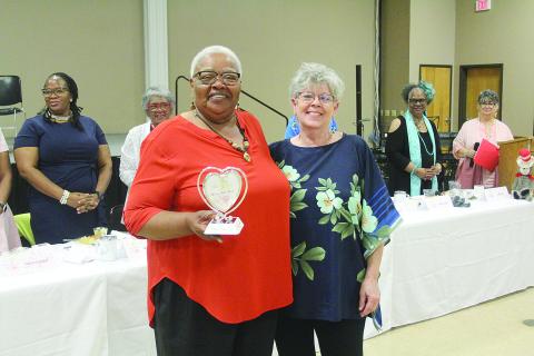 Pictured is Phyllis Green (left) as she accepts the 2023 Woman with Heart Award for Evangeline Parish from St. Landry-Evangeline United Way. Green was presented the award by Suzy Lemoine (right). (Gazette photo by Tony Marks)