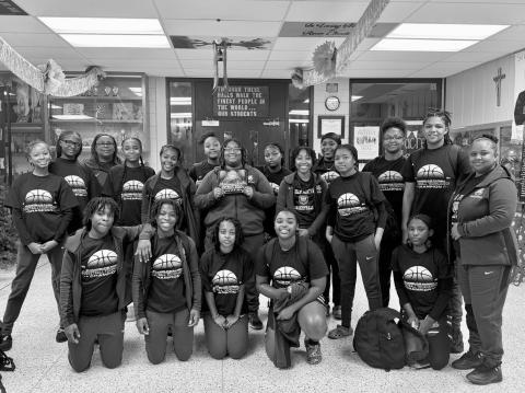In the left photo is the girls’ team which includes players Britelah Freeman, Yazmin Ardoin, Janiah Leday, Marlei Doucet, Aniyah James, Keanna Castille, Danasha Jack, Leah Clark, Cassie West, Brileyah Freeman, Raeosha Thomas, Toni Falkenberry, Kaitlyn Ferguson, Kadrionna Lewis, and Chauncey Tezeno.
