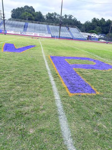 Pictured are a purple “V’ and “P” that were painted at midfield for the Ville Platte High homecoming game against Church Point. The game was interrupted and cancelled because of gun shots. (Gazette photo by Tony Marks)