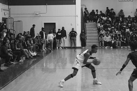 Sage Papillion (22) sets up a play for the Bulldogs of Ville Platte High against Opelousas.
