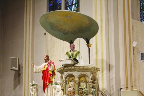 Fr. Tom Voorhies, pastor of Sacred Heart of Jesus Catholic Church  in Ville Platte, served as the celebrant for the Mass held Tuesday, September 8. Fr. Voorhies is pictured as he delivers the homily.