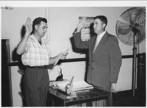 FROM THE ARCHIVES - Walter Lee (right) was sworn in for his first term as Evangeline Parish Clerk of Court on June 1, 1956, by his predecessor Richard Reed. Lee would go on to serve in the role for 56 years. (Gazette file photo)