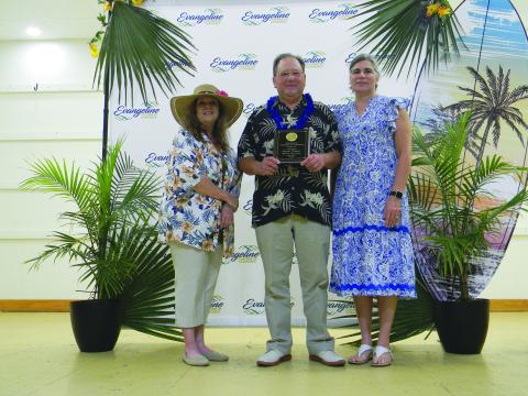 MAN OF THE YEAR - Wayne Vidrine with Evangeline Bank and Trust Company was named Man of the Year. He is shown with Connie Lamke (left) and Angela Fontenot (right). (Gazette photos by Heather Bogard)