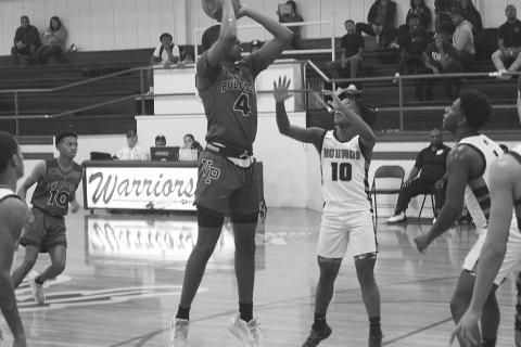 Montavis Seraille (4) attempts a basket for his Ville Platte Bulldogs against the Welsh Greyhounds on the third day of Oakdale’s New Year Tip-Off Presented by RoyOMartin. (Gazette photo by Rhett Manuel)