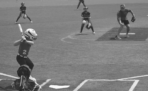 Emry Figueiredo (2) waits for a pitch to cross the plate in a World Series game played in Youngsville. (Gazette photo by Rhett Manuel)