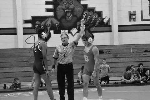 Andre Johnson is declared the winner at 138 pounds.  He was a state runnerup last year, and although a football player, was one of the few pigskin team members to wear a singlet in the opening wrestling action last week. (Photo provided)