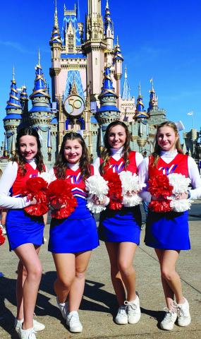 BCE CHEERLEADERS PERFORM AT DISNEY WORLD - From left, Bayou Chicot Elementary cheerleaders Madison Harrington, Carlie Vidrine, Payton Estilette and Brooklyn White pose in front of Cinderella’s Castle at Magic Kingdom in Walt Disney World. (Photo courtesy of Jaimi Vidrine)
