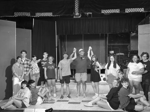 GREASE CAST AT EPT - (left to right, seated) Amelia Bourgeois as Marty, Leo Spell as Sonny, Josephine Ohlenforst as Frenchie, Scarlet Douget as Barbara Jean, and Phillip Cormier as Doody; (standing) Rose Young as Jan, Joe Aucoin as Roger, Laylah Glland as Patty, Tiltie Manuel as Eugene, Bethany Pousson as Cha Cha, Daxton Broussard as Danny Zuko, Gabe Ortego, EPT President, Liana Reed as Sandy, Amelie Fontenot - Ensemble, Deshae Davis as Rizzo, and Hewson Bourgeois as Kenickie.