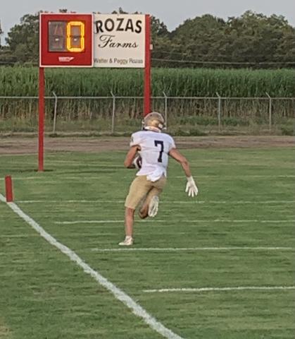 Sacred Heart wide receiver Hayden Droddy runs toward the goal line in the Trojans’ scrimmage against Bunkie. (Gazette photo by Rhett Manuel)