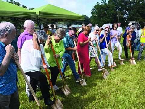 BREAKING GROUND - (from left) Ronnie Landreneau, parish engineer; Faye Langley, Basile representative on the parish library board; Bill Fontenot, parish engineering firm; Sandra Salazar, parish library board; Mark Denette, Basile mayor; Rella Joseph, parish library board; Gaynell Coates, parish library board; Meg Placke, state library director; Wesley Saunders, asst. parish library manager; Sherry Bergeron, Basile library branch manager; and Suzie Lemoine, parish library co-manager.
