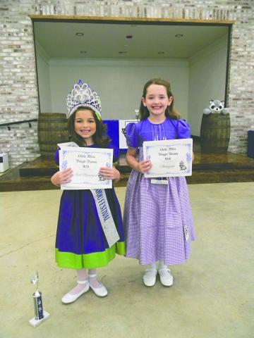 LITTLE MISS COURT - Shown, from left, are the members of the Little Miss Boggy Bayou Court. They are Queen Madlee Rae Wellman and Emma Patterson, first alternate.