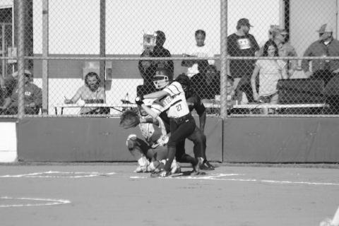 Jennifer Fontenot (27) waits for a pitch to cross home plate in Mamou’s playoff opening win against Springfield. (Gazette photo by Rhett Manuel)