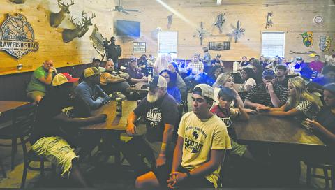 Students, parents, alumni, and fans of Oberlin High School are shown at the gathering held Sunday at the Crawfish Shack where they voiced concerns about the future of the Tiger football program.