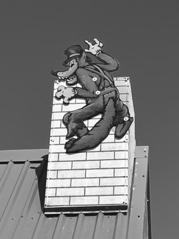 BIG BAD WOLF LOOKING OUT OVER MAMOU - Shown here, a close up of the Big Bad Wolf as he watches the Three Little Pigs down below. (Gazette photos by Heather Bogard)