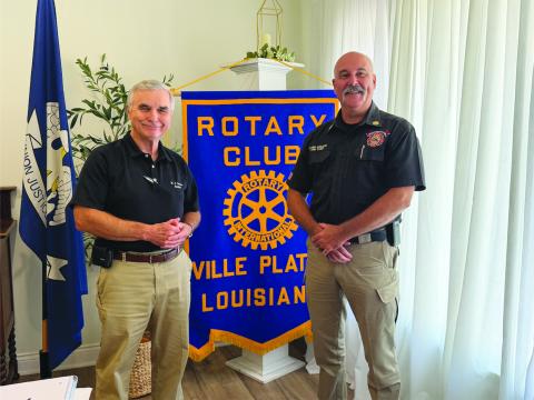 FIRE CHIEF SHARES UPDATE - During the July 21, meeting of the Ville Platte Rotary Club, Fire Chief Chris Soileau gave an update on plans for the new fire station to be located on Main Street, as well as fire safety tips and a brief history of the Ville Platte Fire Department. Soileau is shown with Rotary President Dr. Kirk Soileau (left). (Gazette photo by Heather Bogard)
