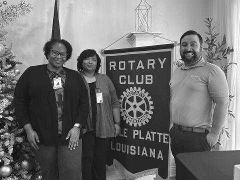 CASA VOLUNTEERS NEEDED - Shown, from left, are Madelyn Rosette and Annette Fruge with CASA and Rotary President Beau Wilson. (Gazette photo by Heather Bogard)