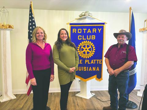 IMPORTANCE OF AGRICULTURE DISCUSSED - Raquel Manuel (center) visited the January 7, meeting of the Ville Platte Rotary Club to discuss the importance of local agriculture. She is shown with Rotarian Nicole Wenger (left) and Rotary President Bob Manuel (right). (Gazette photo by Heather Bogard)