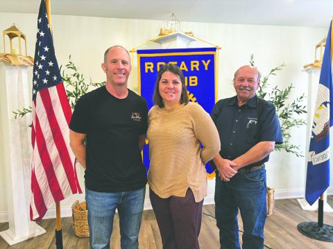 JIU-JITSU GYM OWNER SHARES PASSION FOR SPORT - Robbie Stevens (left) shared his passion for Brazilian Jiu-Jitsu during the February 25, meeting of the Ville Platte Rotary Club. He is shown with Rotarian Kristi Enicke (center) and Rotary President Bob Manuel (right) (Gazette photo by Heather Bogard)