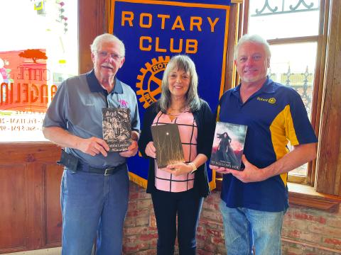 LAWSON DISCUSSES SELF PUBLISHING - Debby Lawson visited the February 28, meeting of the VIile Platte Rotary Club to discuss the process of writing novels and getting them self-published. Shown, from left, are Rotarian Kermit Miller (left), Lawson and Rotary President Larry Lachney (right). (Gazette photo by Heather Bogard)