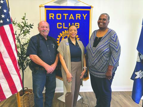 ROTARIANS LEARN ABOUT CASA - Alisha Arvie (center) shared the importance of the CASA organization to those youth in foster care during the March 25, meeting of the Ville Platte Rotary Club. She is shown with Rotary President Bob Manuel (left) and Rotarian Linda Fontenot (right). (Gazette photo by Heather Bogard)