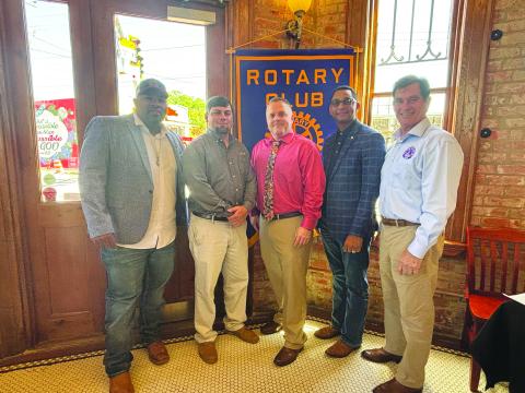UPDATE ON BROADBAND SERVICE GIVEN -  LUS Interim Fiber Director Jeffery Stewart and Chief Engineer Eric Grimmet presented an update on fiber optic Internet services coming to Ville Platte starting in April. Shown, from left are Ville Platte Mayor and Rotarian Ryan Leday Williams, Grimmet, Stewart, Rotary President Brian Ardoin and Ville Platte City Clerk/Secretary-Treasurer Donald Bergeron. (Gazette photo by Heather Bogard)