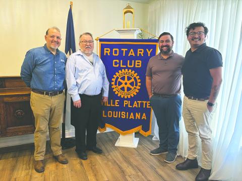 BAYOU CREATIVE VISITS ROTARY - Christopher Holmes and Jacob Ambriz with Bayou Creative addressed the March 31, meeting of the Ville Platte Rotary Club. Shown, from left, are Holmes, Rotarian Dan Poret, Rotary President Beau Wilson, and Ambriz. (Gazette photo by Heather Bogard)