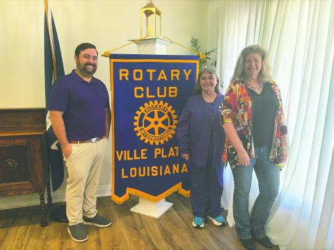 UPDATES HEARD - During the April 7, meeting of the Ville Platte Rotary Club, Heritage Manor Activity Director Patricia Duplechin (center) and KVPI Station Manager and Swamp Pop Museum Director Misty Parker (right) shared several updates with their fellow Rotarians. They are shown with Rotary President Beau Wilson (left) (Gazette photo by Heather Bogard)