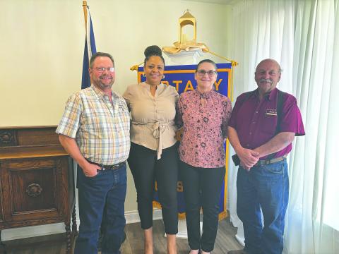 WELDING JOB PROSPECTS DISCUSSED - Rotarian Carleen Sylvester, during the April 22, meeting of the Ville Platte Rotary Club, invited welder Roddy Fontenot to discuss the welding industry. Shown, from left, are Fontenot, Sylvester, Katie McFarlin (SoLAcc student) and Rotary President Bob Manuel (right). (Gazette photo by Heather Bogard)