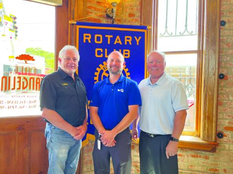 ROTARIANS HEAR UPDATE ON CAMERON - David Matthews, plant manager at SLB Cameron (center) was the guest speaker for the May 2, meeting of the Ville Platte Rotary Club. He is shown with Rotary President Larry Lachney (left) and Rotarian Dr. Hosea “Joey” Soileau (right). (Gazette photo by Heather Bogard)