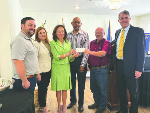 LSUE SCHOLARSHIP PRESENTED - During the May 6, meeting of the Ville Platte Rotary Club, the group presented its annual LSUE Scholarship donation to the school. Shown, from left, are Rotarian Beau Wilson; Carey Lawson, Executive Director of the LSUE Foundation; Dr. Nancee Sorenson, Chancellor of LSUE; Rotarian Clem LaFleur; Rotary President Bob Manuel; and Dr. John Hamlin, Vice Chancellor for Academic Affairs at LSUE. (Gazette photo by Heather Bogard)