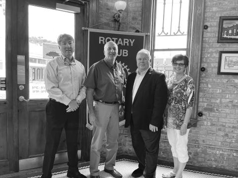 STATE OF LOCAL ECONOMY DISCUSSED - Dr. Randall Dupont, dean of the College of Business at LSU-Alexandria, gave an update on the local and state economy during the May 10, meeting of the Ville Platte Rotary Club. Shown, from left, are Rotary President Jimmy LeBlanc, Marty Morein, Dr. Dupont and Rotarian Annette Johnson. (Gazette photo by Heather Bogard)