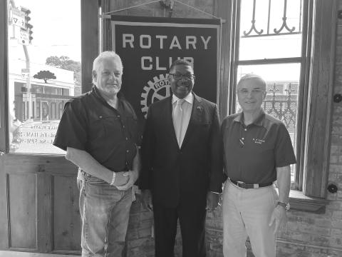 DR. WILSON ADDRESSES ROTARIANS - Louisiana DOTD Secretary Dr. Shawn Wilson (center) was the guest speaker for the May 16, meeting of the Ville Platte Rotary Club. He is shown with Rotary President Larry Lachney (left) and Rotarian Dr. Kirk Soileau (right). (Gazette photo by Heather Bogard)