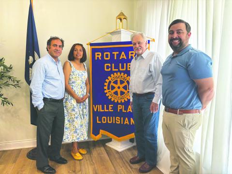 SAWTELLES SHARE CAMINO JOURNEY - Shown, from left, are Pastor Steven and Sarahi Sawtelle, Rotarian Dr. William “Tojo” Ward and Rotary President Beau Wilson. During the May 26, meeting of the Ville Platte Rotary Club, The Sawtelles shared their experience walking the Camino in Spain for 28 days. (Gazette photo by Heather Bogard)