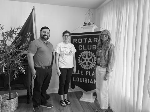 ROTARIANS LEARN ABOUT NATIVE PLANTS - Dr. Phyllis Griffard with the Acadiana Native Plant Project (center) shared an update on the organization’s work in promoting native plants. She is shown with Rotary President Beau Wilson (left) and Rotarian Nicole Wenger (right). (Gazette photo by Heather Bogard)