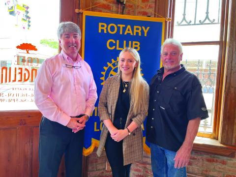 NEW AESTHETIC SERVICES AVAILABLE - Darrelyn Lachney visited the June 7, meeting of the Ville Platte Rotary Club to discuss her new aesthetic venture and the services that will be available. She is shown with Rotary President Jimmy LeBlanc, left, and her father and Rotarian Larry Lachney, right. (Gazette photo by Heather Bogard)