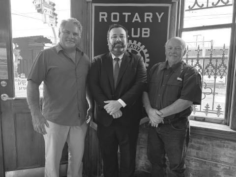 VP ATTORNEY SHARES UPDATE -  Attorney Jacob Fusilier (center) addressed the July 2, meeting of the Ville Platte Rotary Club. He is shown with Rotarian Eric Gil (left) and Rotary President Bob Manuel (right). (Gazette photo by Heather Bogard)