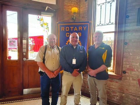 CABOT SHARES PROJECT DETAILS -  Marty Robinson with Cabot (center) addressed the July 9, meeting of the Ville Platte Rotary Club. He is shown with Rotary President Bob Manuel (left) and Rotarian Larry Lachney (right). (Gazette photo by Heather Bogard)