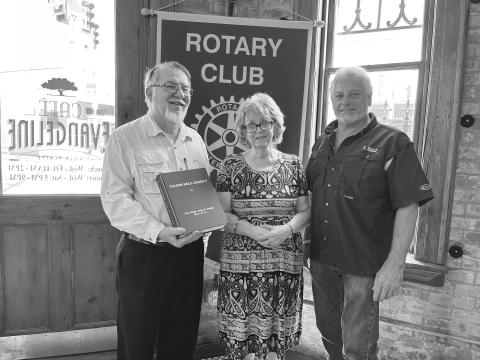 FRENCH ROUND TABLE MEETS - Jackie Miller visited the July 19, meeting of the Ville Platte Rotary Club to discuss the French Round Table held on Monday afternoons at Hundredfold Coffee. She is shown with Rotarian Dan Poret (left) and Rotary President Larry Lachney (right). (Gazette photo by Heather Bogard)