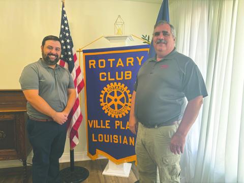 SMITH SHARES UPDATE ON AIR CONDITIONING INDUSTRY - Rotarian Scott Smith shared information on the air conditioning industry during the July 22, meeting of the Ville Platte Rotary Club. He is shown with Rotary President Beau Wilson (left). (Gazette photo by Heather Bogard)