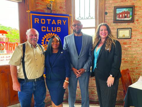 CHILDREN’S TRUST FUND WORK SHARED - Shown, from left, are Rotary President Bob Manuel; guest speaker Ursula Anderson, Executive Director of the Louisiana Children’s Trust Fund; Rotarian Clem LaFleur; and guest speaker Amanda Shackelford with LYFE.  (Gazette photo by Heather Bogard)