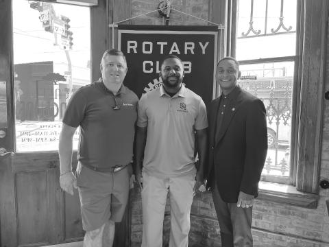 JONES DISCUSSES SHS BASKETBALL - New Sacred Heart High School basketball coach Cody Jones (center) visited the July 25, meeting of the Ville Platte Rotary Club as the guest of Dr. Jeb Cormier (left). They are shown with Rotary President Brian Ardoin (right). (Gazette photo by Heather Bogard)