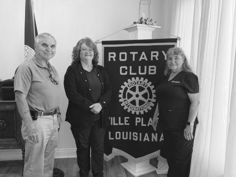 NURSING HOME ADMISSIONS ADDRESSED - During the July 28, meeting of the Ville Platte Rotary Club, Melanie Wolff, admissions coordinator at Heritage Manor Nursing Home, was the guest of Rotarian Patricia Duplechin (right). They are shown with Rotary President Dr. Kirk Soileau (left). (Gazette photo by Heather Bogard)